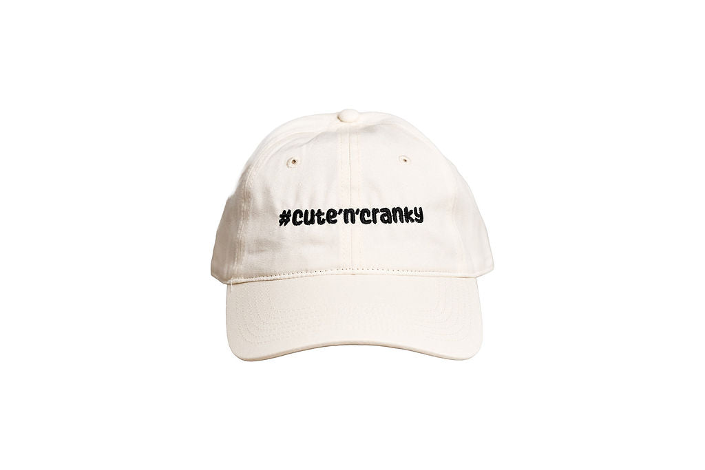 #cute’n’cranky Ecru Cap – Black Logo | Angry Penguins Strapback- Front