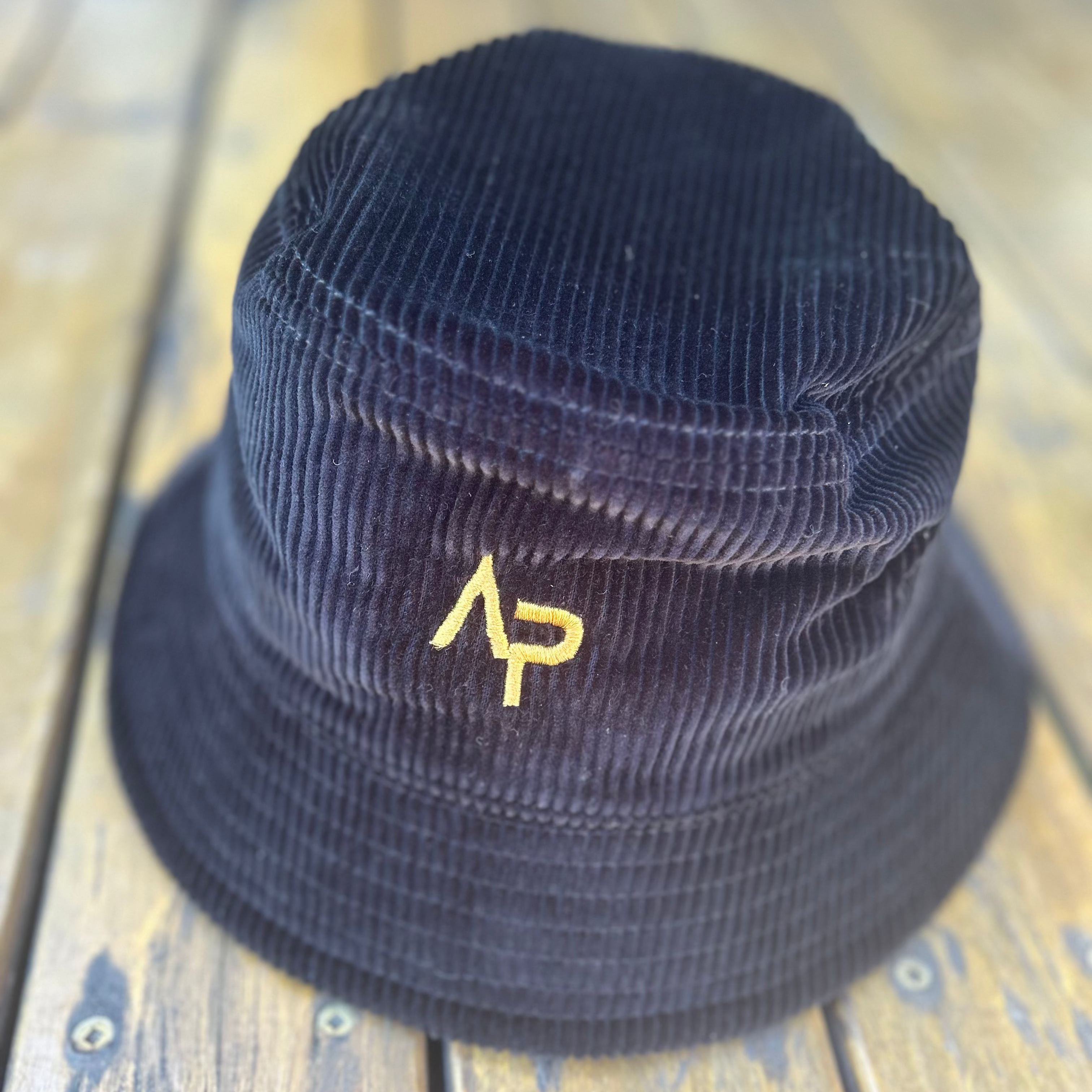 AP Bucket Hat Black with Gold logo | Angry Penguins | Cotton Sun Protection - Front View
